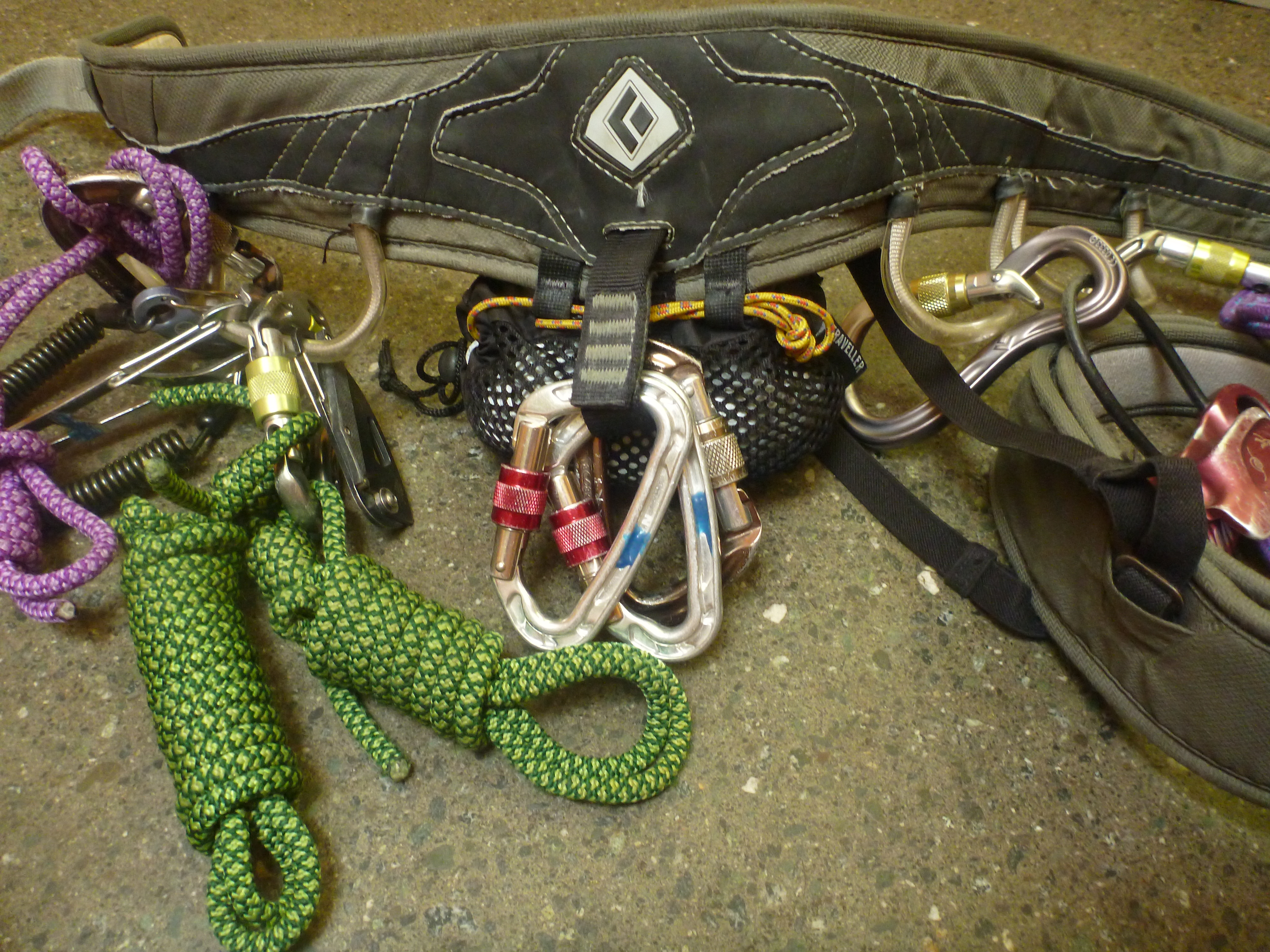 Jacket attached to climbing harness.