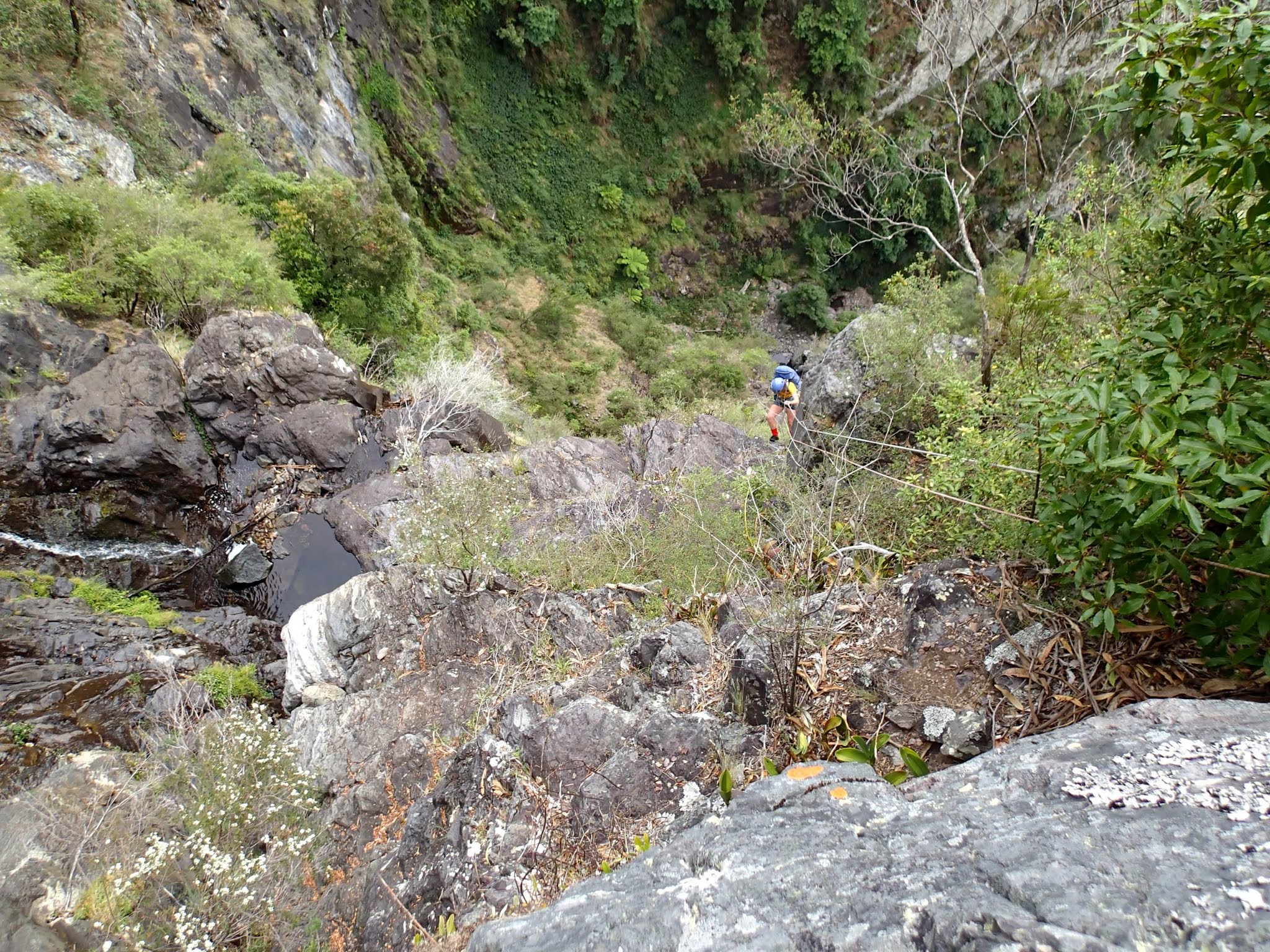 Helen going down the main drop of Carrabeanga Falls.