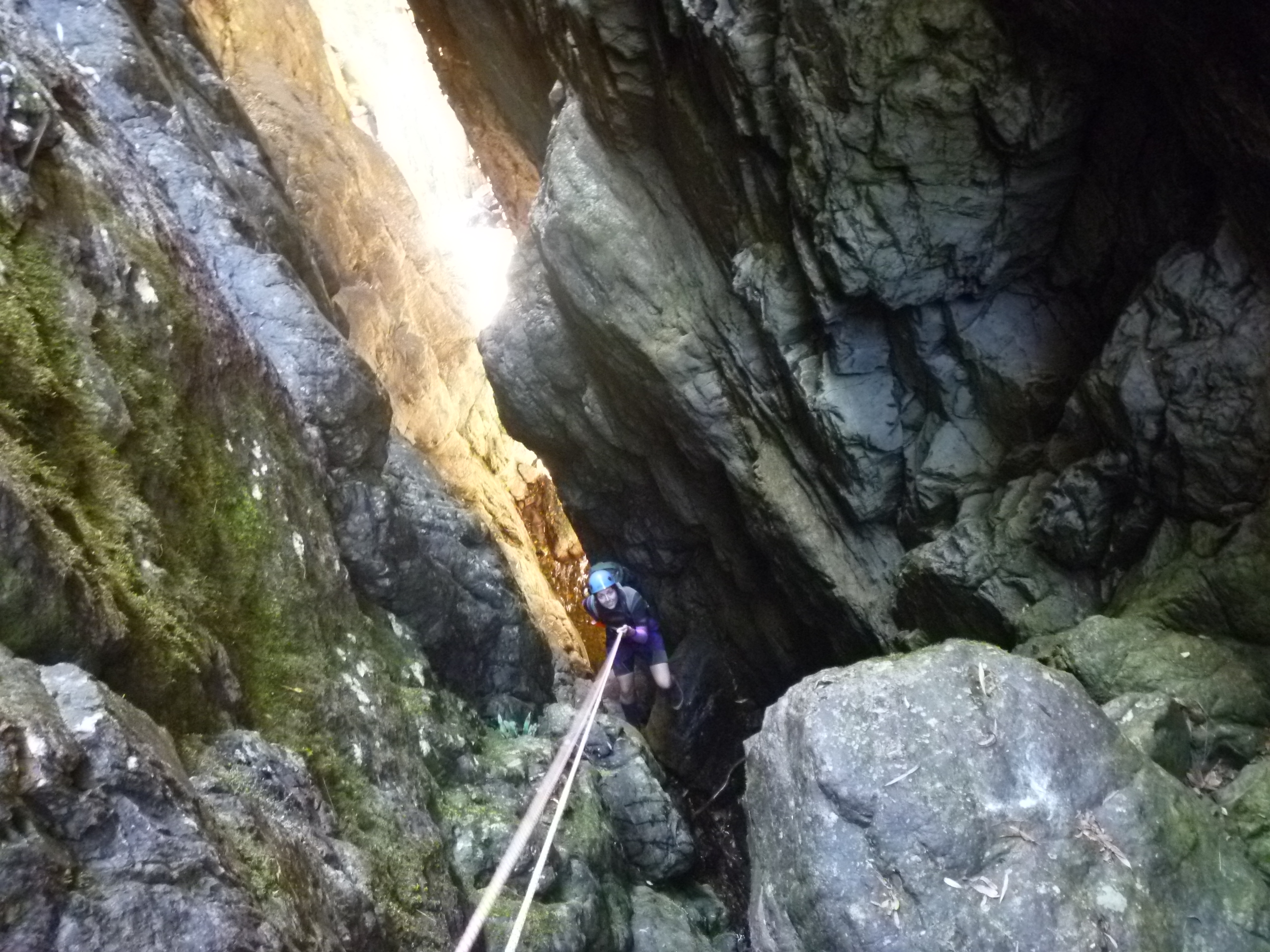 Kimberly on abseil 3, heading for the chockstone